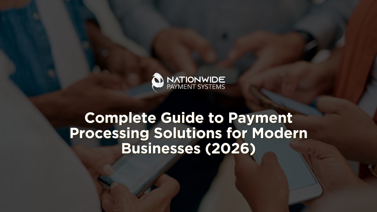 A close-up view of multiple people standing in a circle, focused on using their smartphones. White text overlays the center reading "Complete Guide to Payment Processing Solutions for Modern Businesses (2026)," with the white Nationwide Payment Systems logo positioned directly above it.