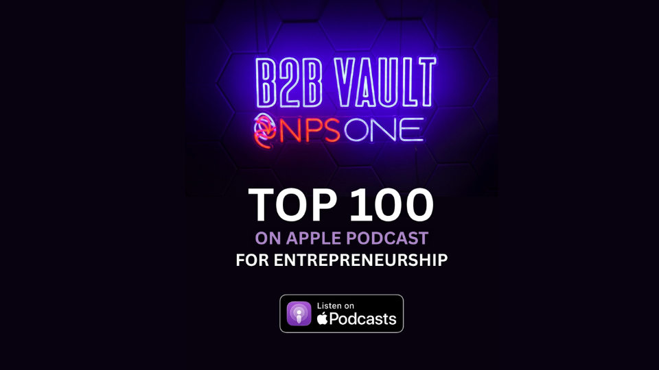 A congratulatory graphic featuring a neon-style logo for "B2B Vault NPS One" on a dark hexagonal background. Bold white text below reads "TOP 100 ON APPLE PODCAST FOR ENTREPRENEURSHIP." A "Listen on Apple Podcasts" badge is positioned at the bottom center.