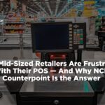 A professional point-of-sale checkout counter in a retail supermarket environment with a blurred store aisle in the background. Bold white text overlays the image: "Why Mid-Sized Retailers Are Frustrated With Their POS — And Why NCR Counterpoint Is the Answer," accompanied by the Nationwide Payment Systems logo in the top left corner.