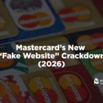 A close-up, top-down view of multiple red, gold, blue, and green Mastercard credit and debit cards layered on top of each other. Overlaid bold white text in the center reads "Mastercard's New 'Fake Website' Crackdown (2026)," with the white Nationwide Payment Systems logo anchored neatly in the bottom right corner.