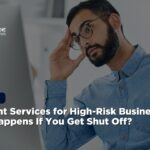 A close-up shot of a stressed male professional with a beard and glasses looking intensely at a computer monitor while touching his temple in worry. A dark blue lower-third banner features white text reading "Merchant Services for High-Risk Businesses: What Happens If You Get Shut Off?" alongside a "Tuesday Series" tag and the Nationwide Payment Systems logo in the top left corner.