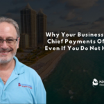 A smiling man in a light blue polo shirt with the Nationwide Payment Systems logo, positioned in front of a coastal city skyline. Text reads "Why Your Business Needs a Chief Payments Officer — Even If You Do Not Hire One."